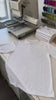 How embroidery works: logo stitched into the fabric, digitised, hooped and run in one pass